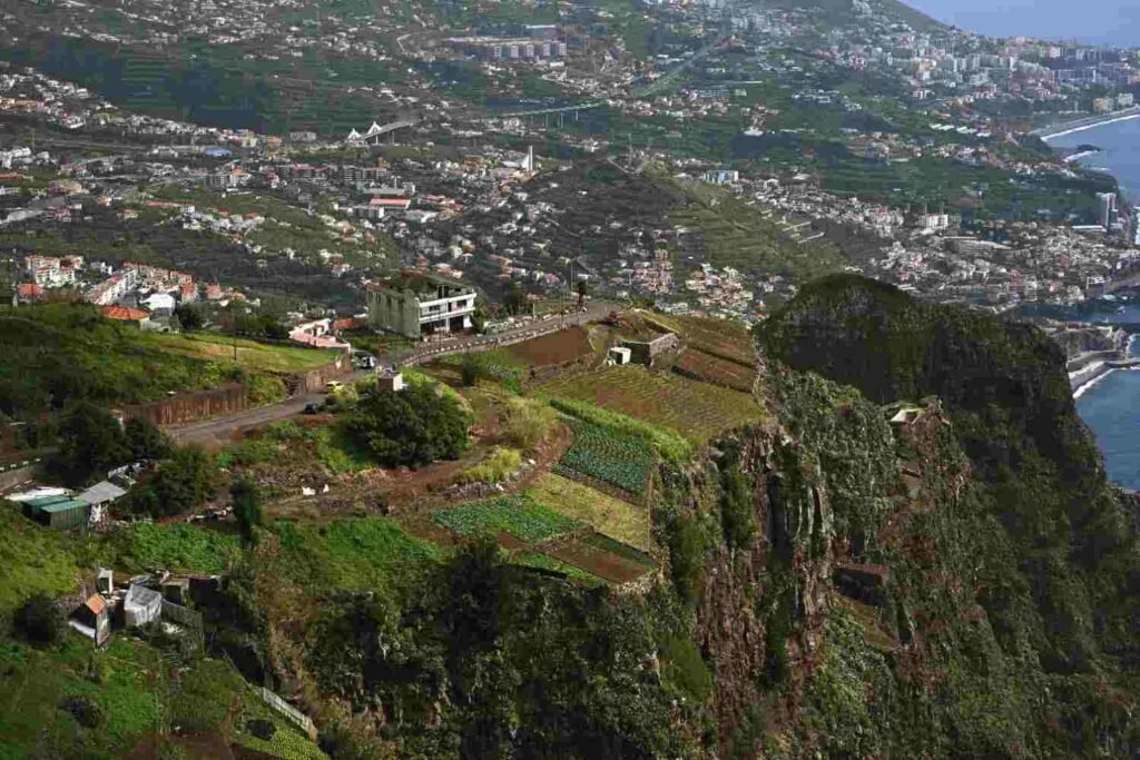 Madeira Portugal mountain landscape with green gardens and ocean views