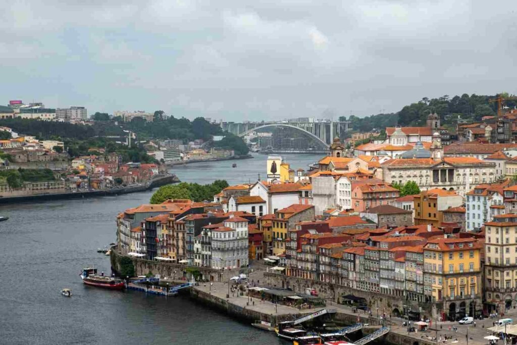 Colorful riverside buildings overlooking the Douro River in Porto, Portugal.