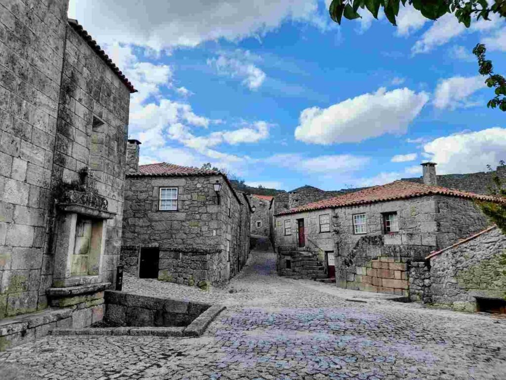 Traditional granite houses and cobblestone streets in a medieval Portuguese village